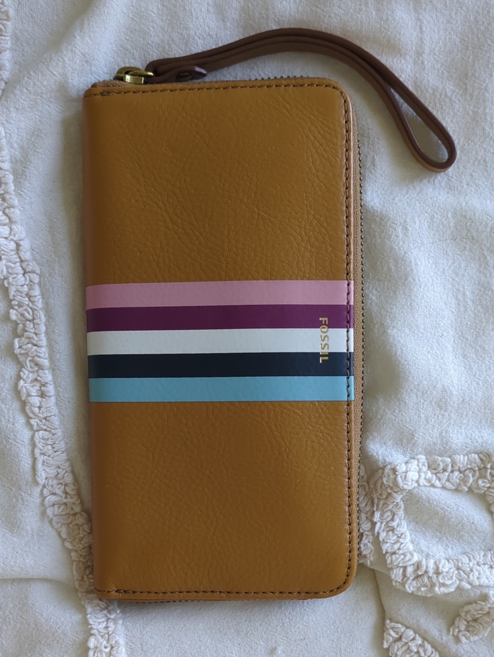 Fossil Tan Wristlet Wallet with Pink, Purple, White, Black and Blue Stripes